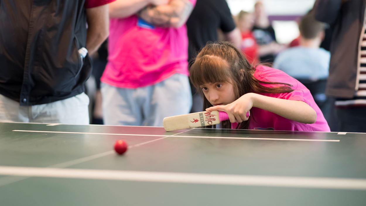 Girl concentrates on batting.jpg