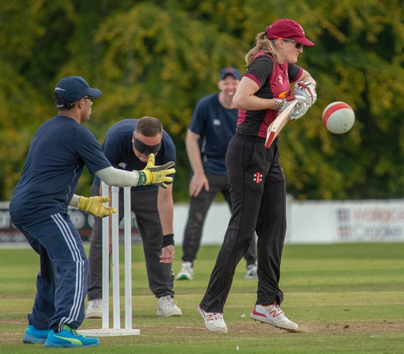 Kathryn defends a waist high ball.jpg (2)