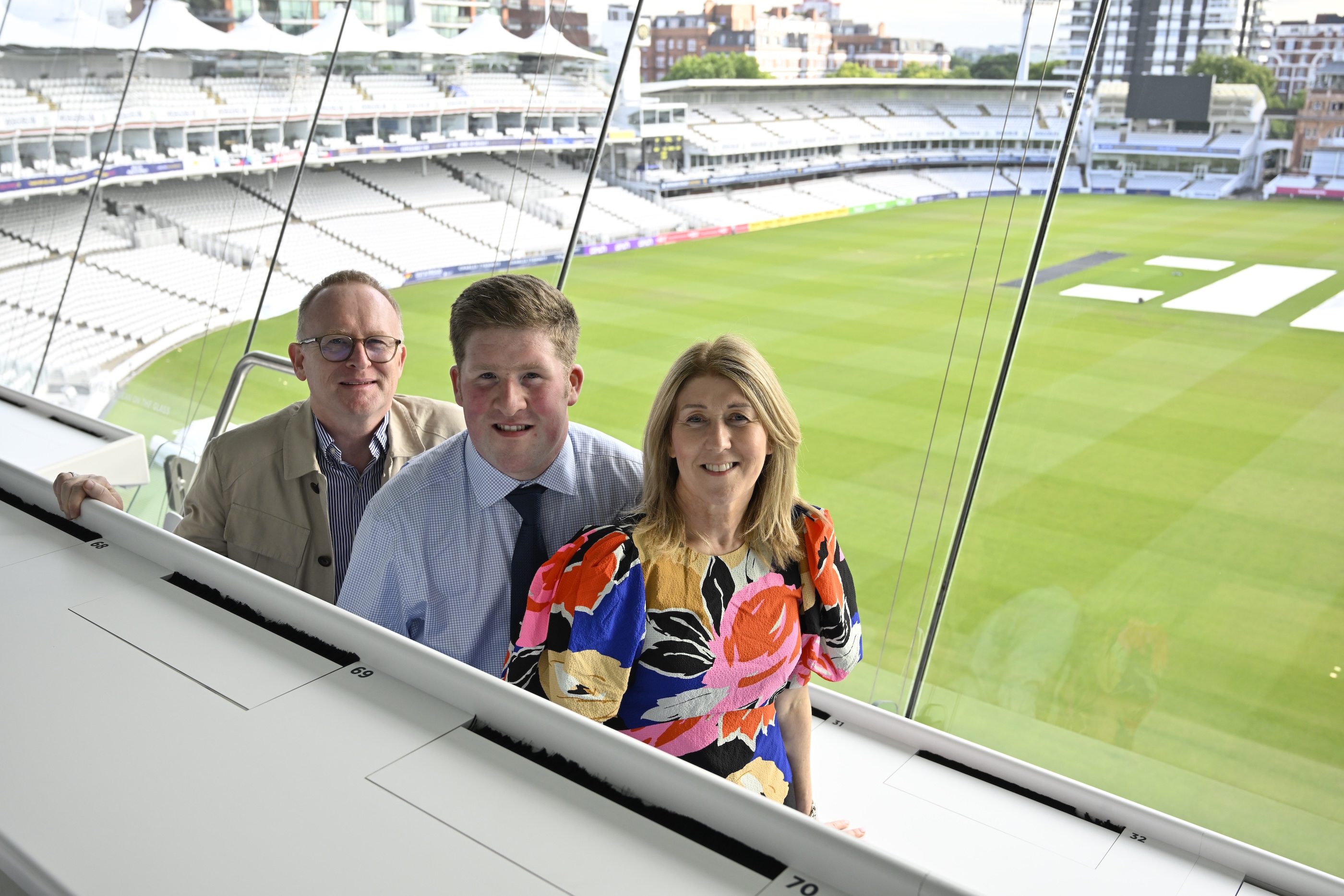 Charlie with his parents in the Media Centre at Lord's