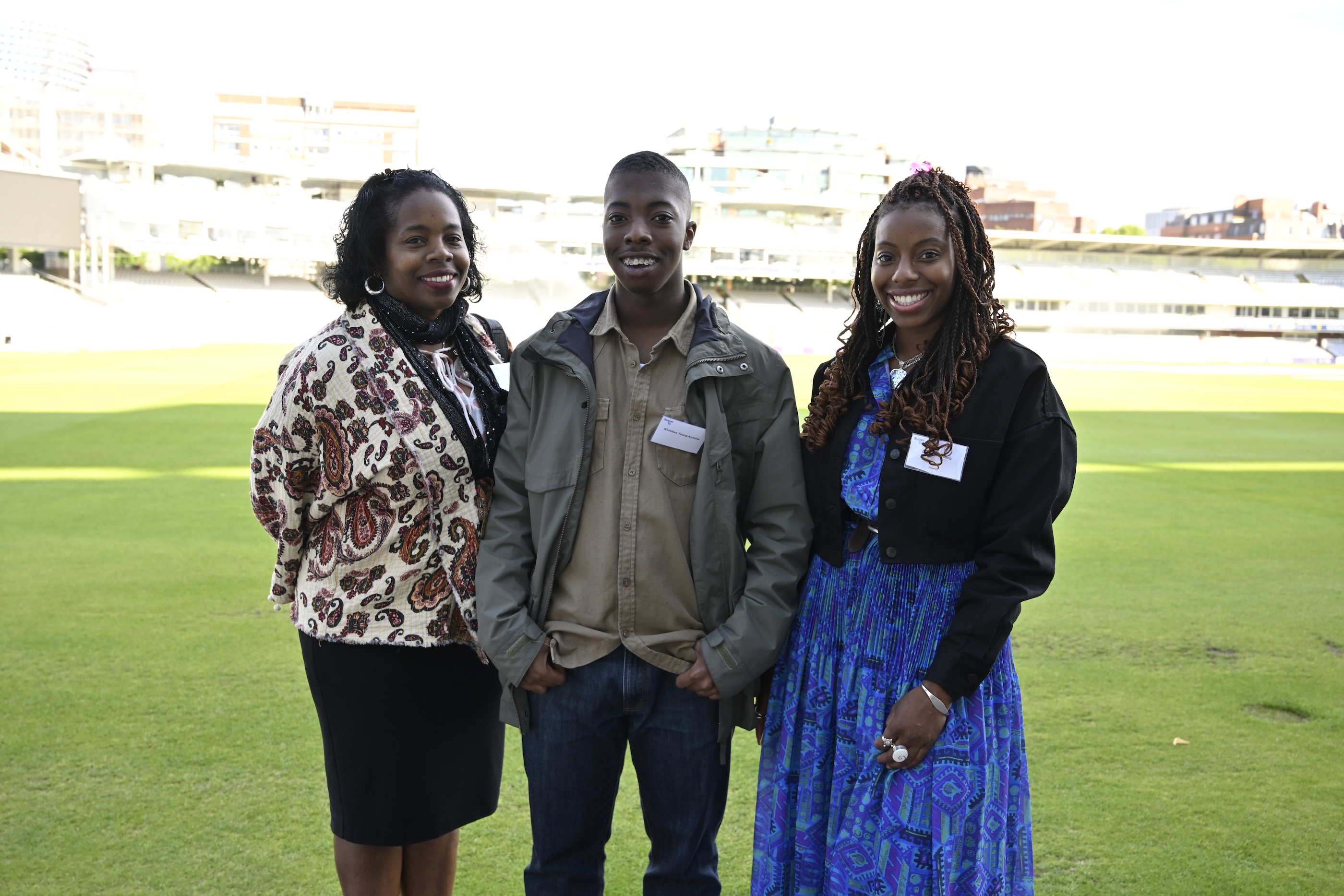 Khristian with his family on the outfield at Lord's.jpg