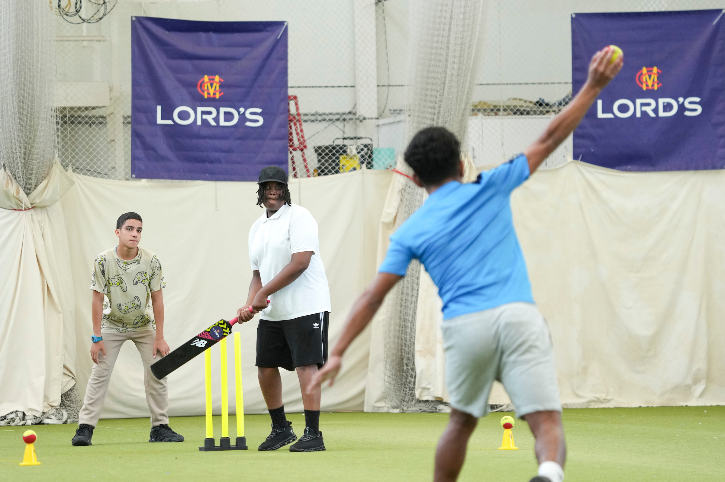 Super 1s participants playing cricket in the Lord's Indoor School.jpg